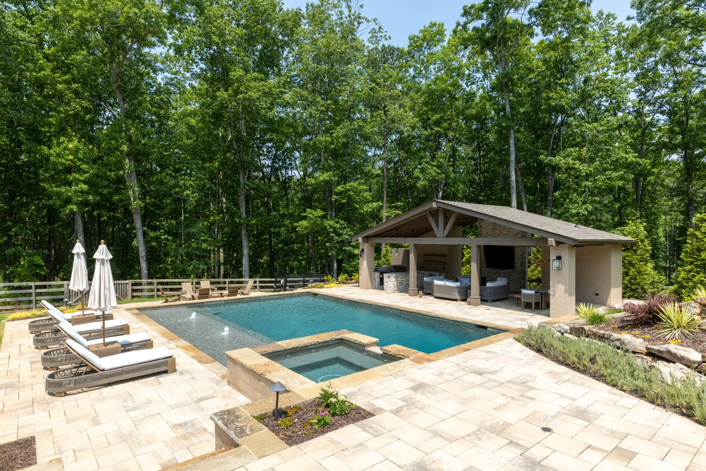 Wide view of the Kahtri project in Roswell with pool, raised spa, and pavilion