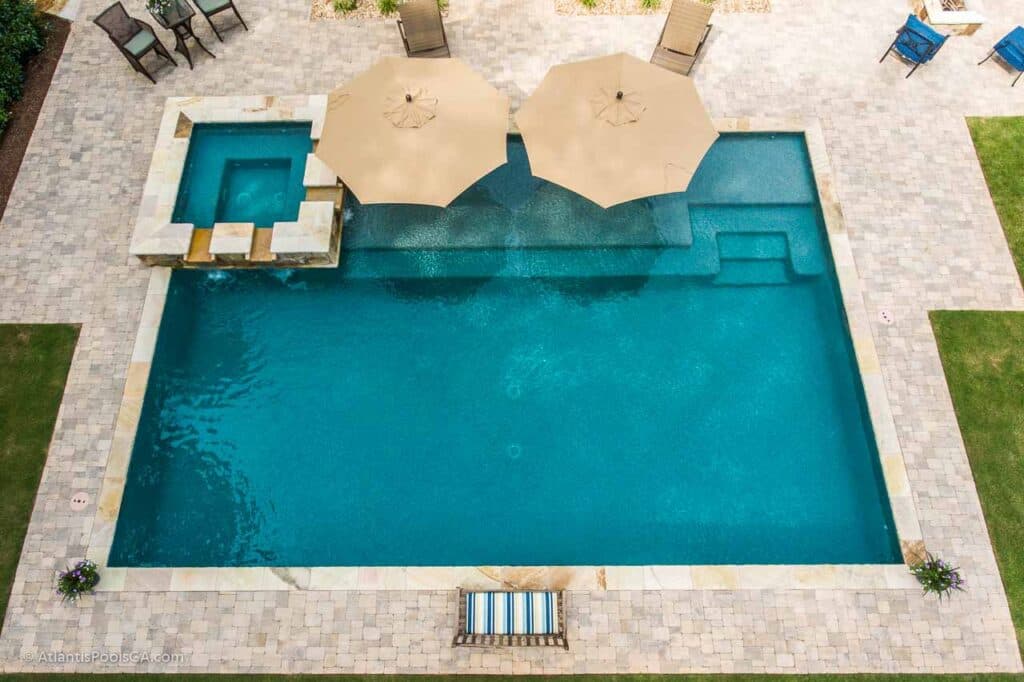 Aerial view of a complete Atlantis pool and outdoor living environment
