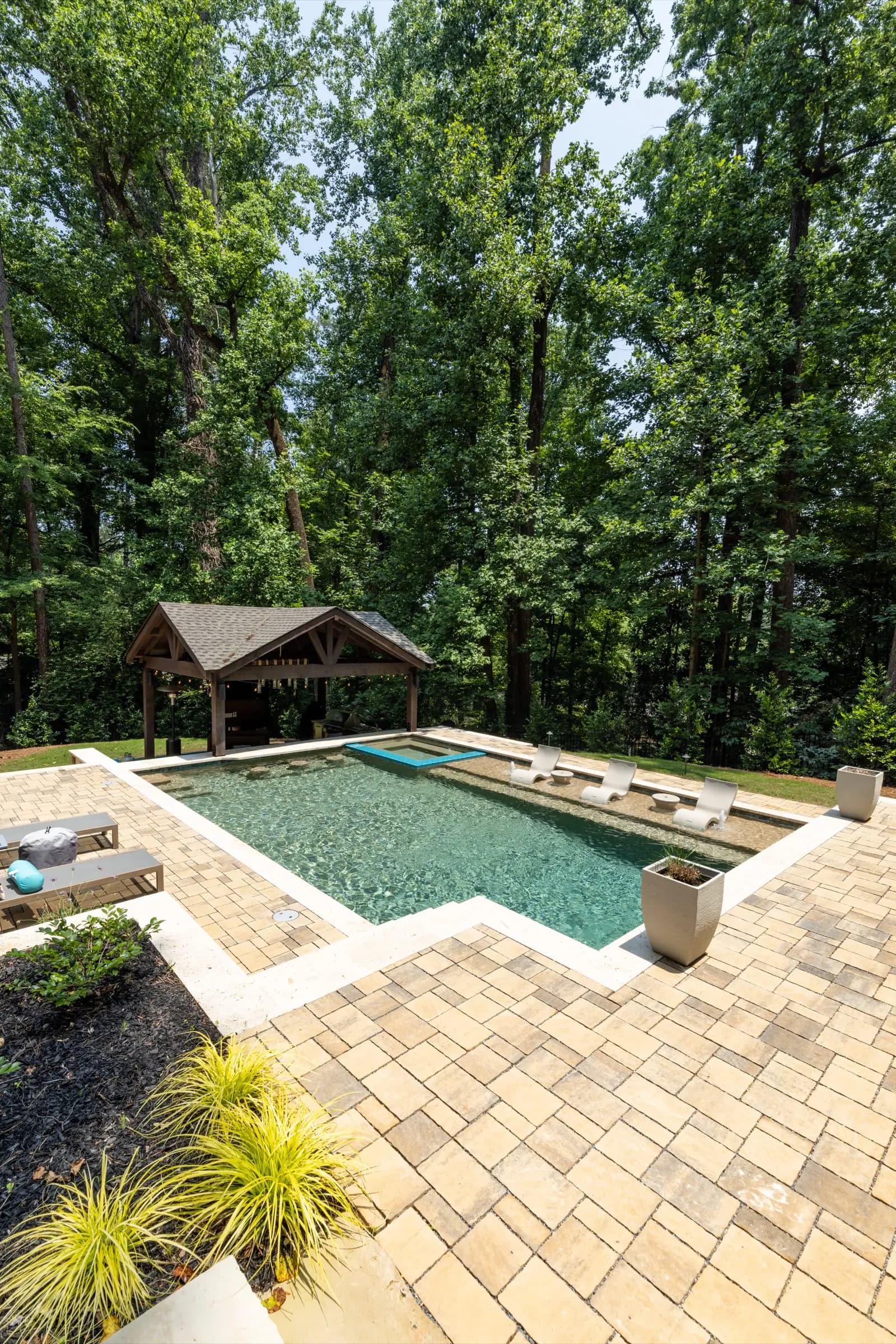 Aerial view of the Rutecky pool in Brookhaven, one of the named Atlantis projects still publishing its full write-up